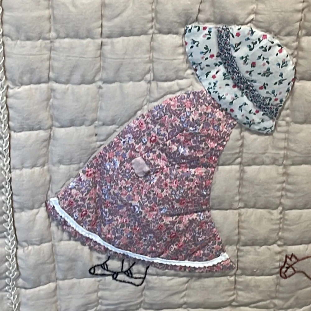 Appliqued and embroidered quilt